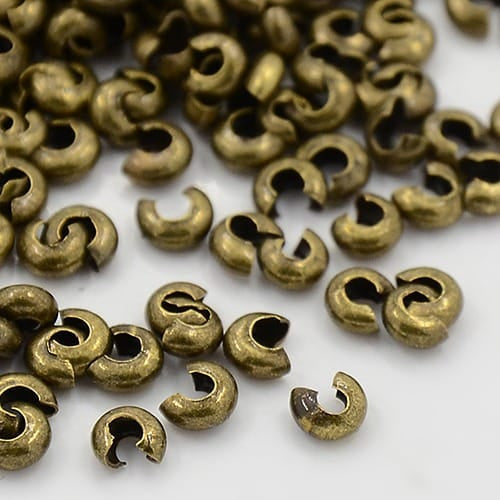 4mm Antique Brass Crimp Covers x 25