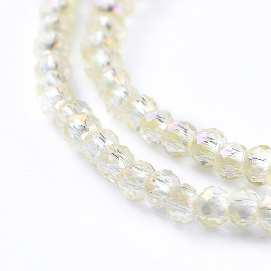 Etoile Micro Crystal Rondelles 2x1.5mm - Strand of approx 200 - Champagne