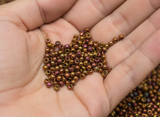 11/0 Miyuki Seed Beads - 25g Bag – Transparent Tea Berry Gold Iris – Colour 2449
