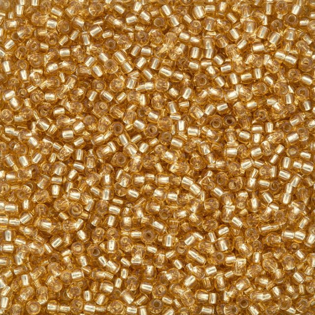 11/0 Toho Seed Beads - 10g Bag β Silver Lined Lt Topaz