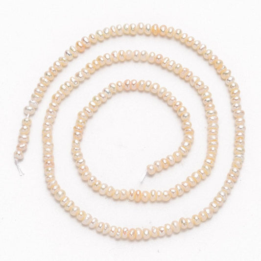 2x3mm Tiny Cream Button Pearls - Strand of approx 150