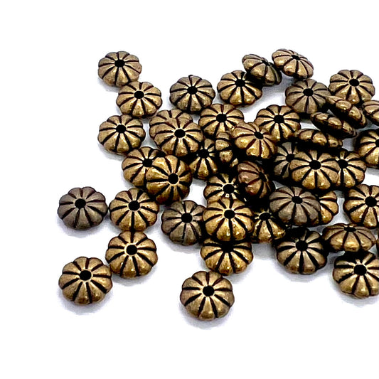 Antique Brass 7mm Flower Spacers – Pack of 20