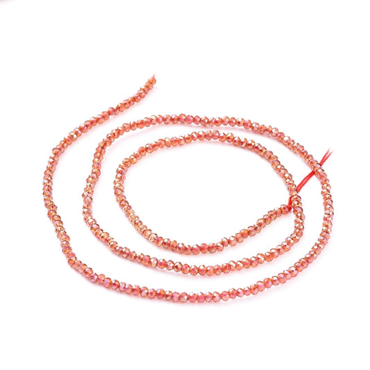 Etoile Micro Crystal Rondelles 2×1.5mm – Strand of approx 200 – Canteloupe Luster